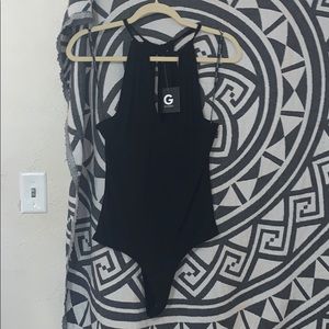 G by Guess bodysuit. New with tags!